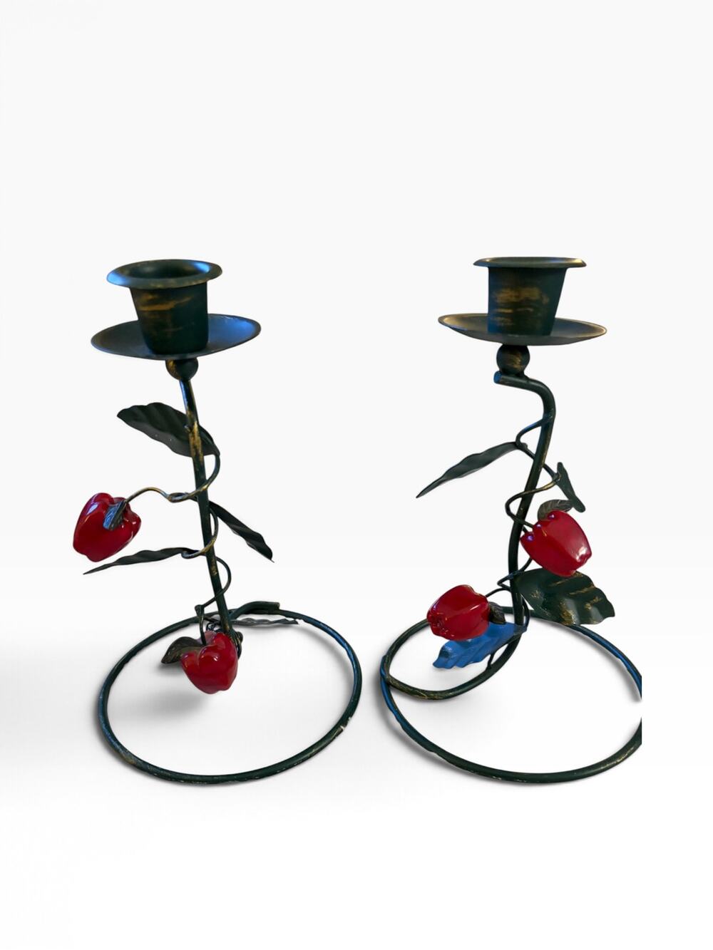 Vintage iron vine candle holder set with glossy red bell pepper accents.